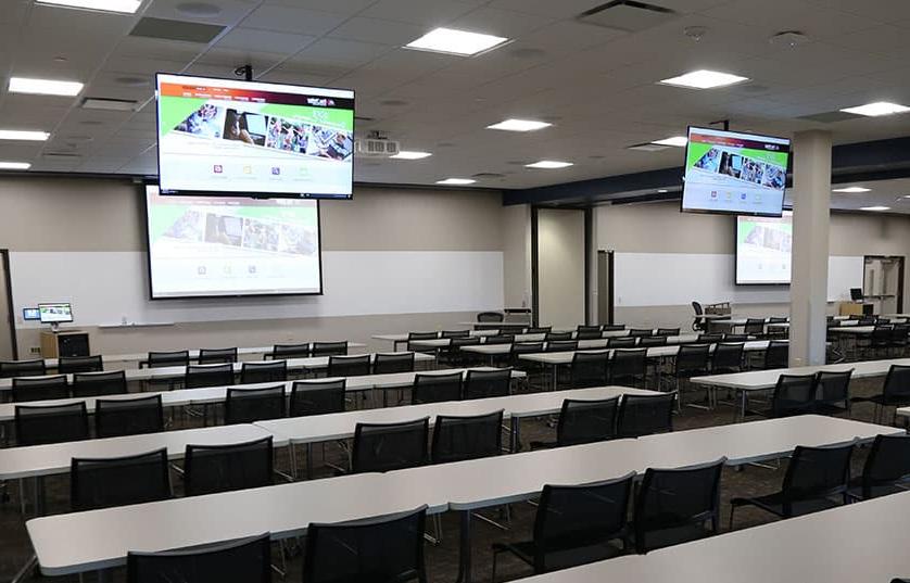 classroom at fox valley technical college with screens hanging from ceiling